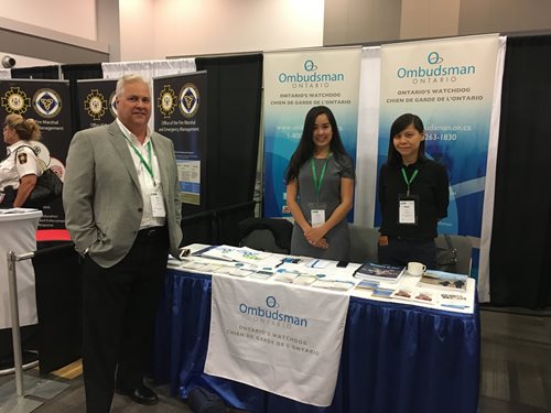 The Ombudsman and two employees during the AMO conference in August 2017