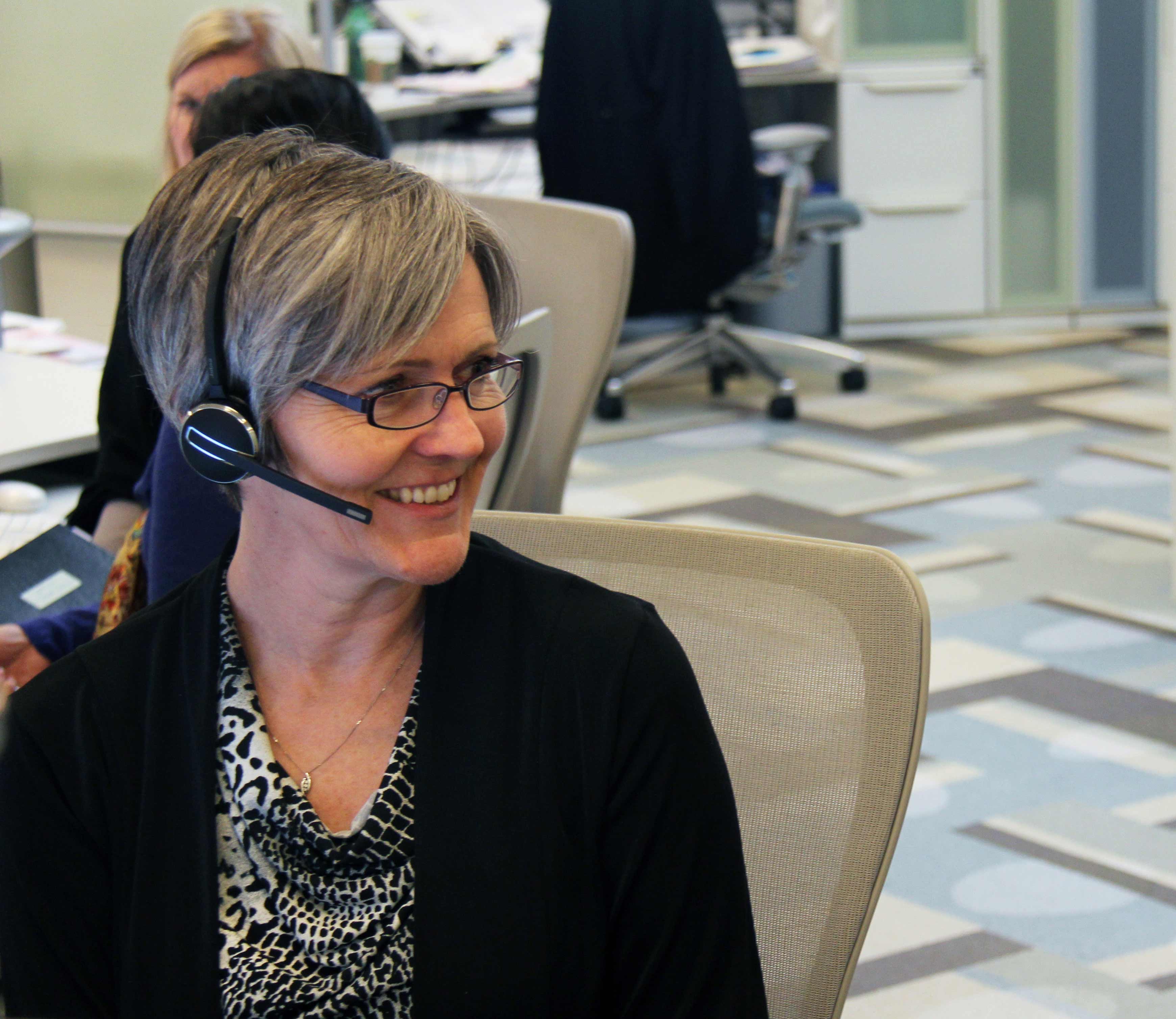 an employee of the office of the Ontario Ombudsman, wearing a headset