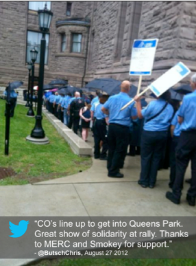 Tweet: "COs line up to get into Queen's Park. Great show of solidarity at rally. Thanks to MERC abd Smokey for support." @ButschChris, August 27, 2012