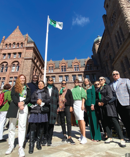 Ombudsman Paul Dubé (right) and Commissioner Kelly Burke attend the Franco-Ontarian Day flag-raising alongside staff from our Office, at Queen’s Park, Toronto.