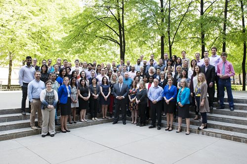 Members of staff of the Office of the Ontario Ombudsman posing for the picture, standing outside the office building.