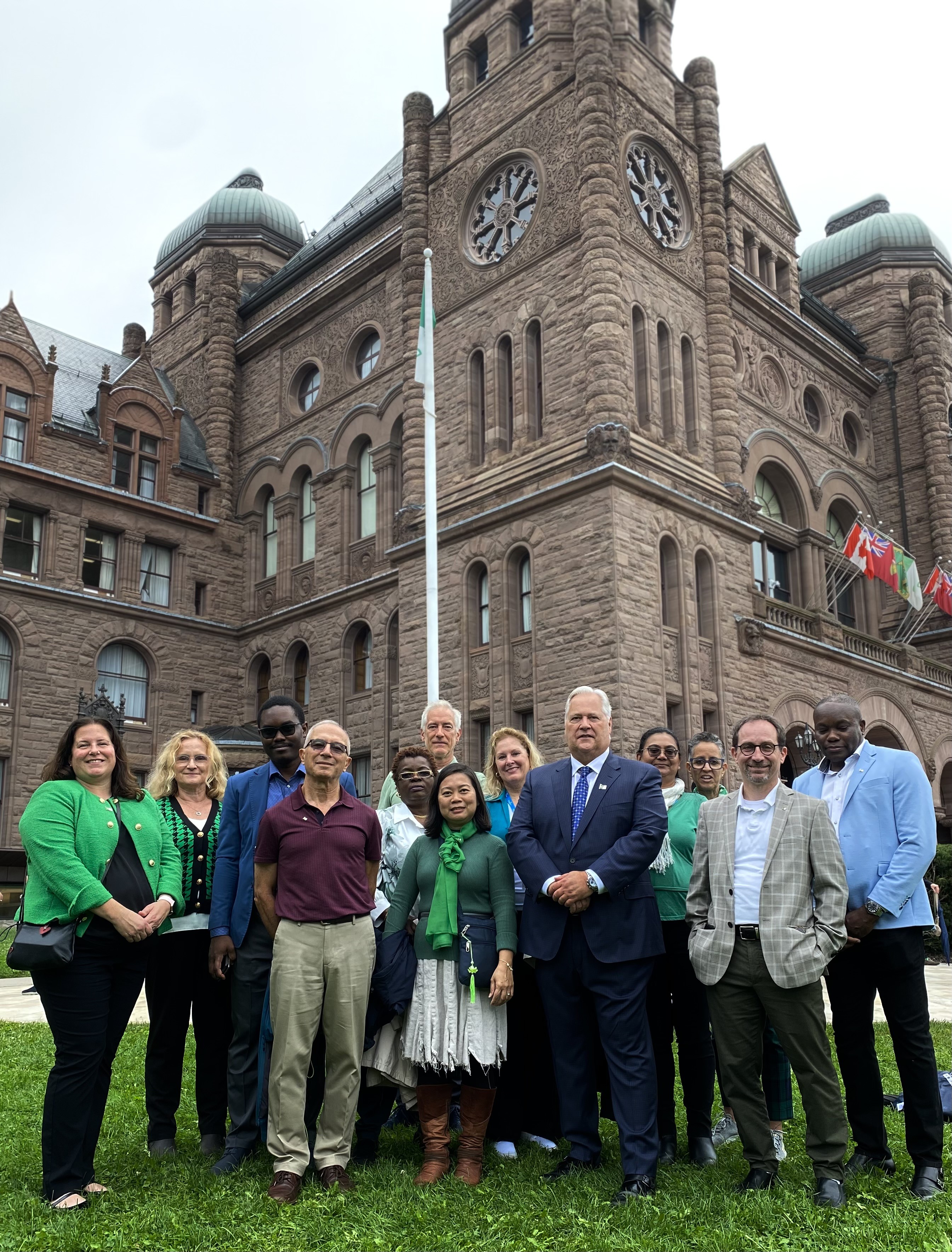 Ombudsman with members of the French Language Services Unit at the Franco-Ontarian Day flag raising
