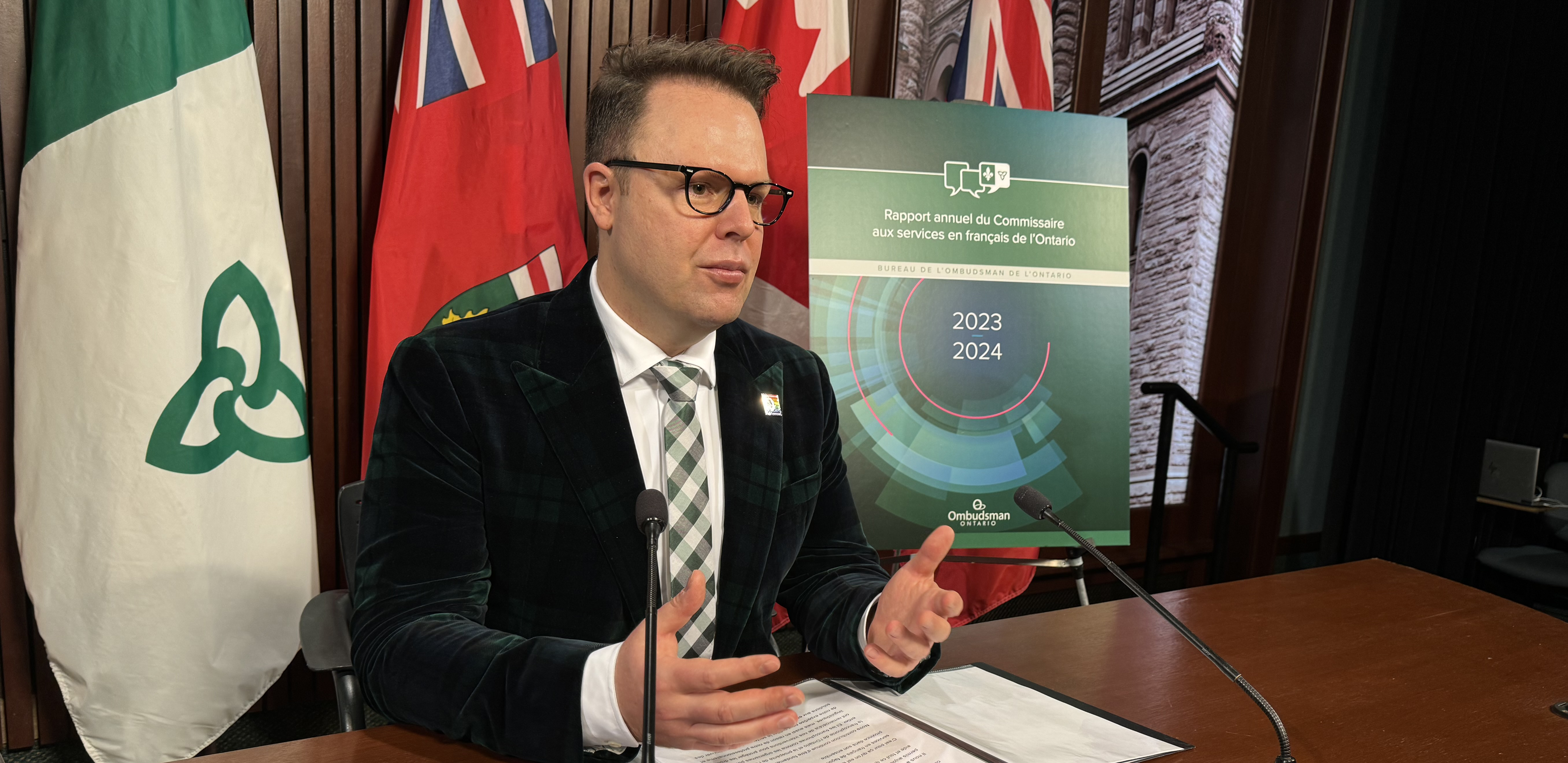 Commissioner during a press conference at Queen's Park