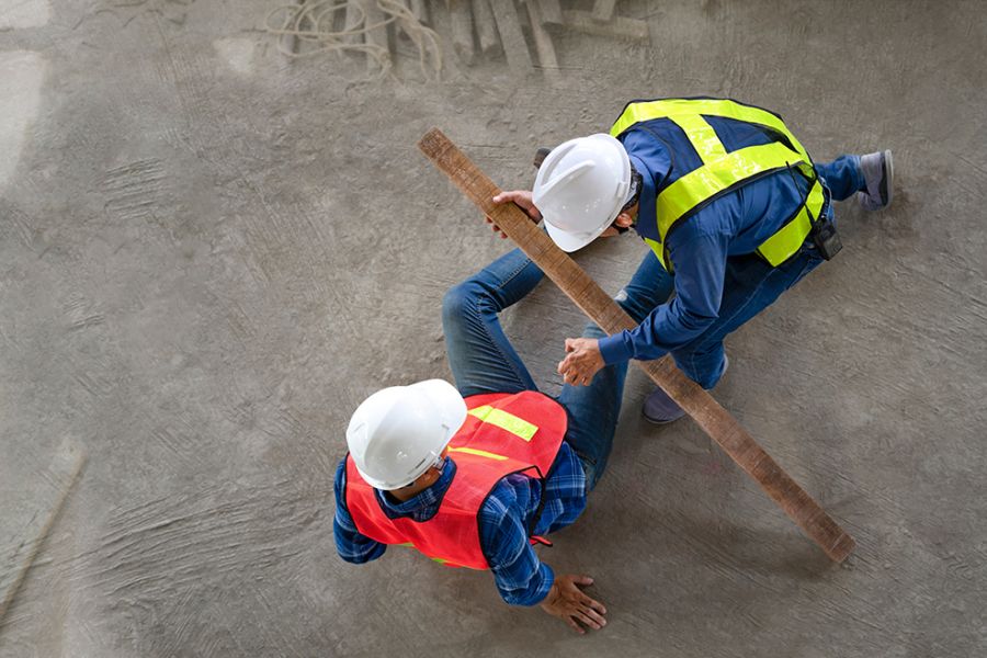 Two workers on a construction site