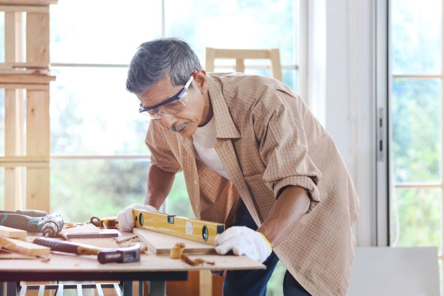 Tradesperson working at a table